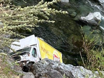Frito-Lay truck crash-lands at Smith River, driver escapes with minor injuries
