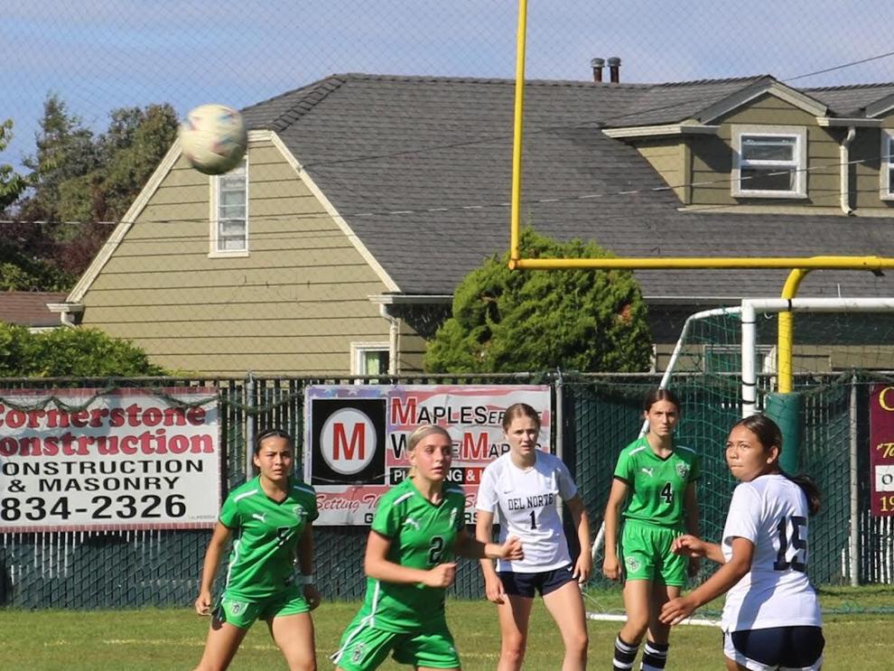 Del Norte girls soccer team huddle
